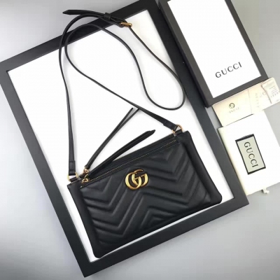 【gucci·leather 】原單出品，單肩斜挎&小手包，採用進口小牛皮，配以人形紋設計，可拆卸按扣手拿包，配以頂部拉鍊扣，古銅色金屬配件，官方獨有的身份代碼 專櫃品質、實物實拍，453878，尺寸:25.5x 14.