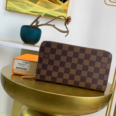 LV LOUIS VUITTON路易威登 新內裡！N63502 咖 ZIPPY ORGANIZER 拉鍊錢夾 由經典Damier Ebene帆布裁制而成的Zippy Organizer拉鍊錢夾，極為緊致小巧的造型，兼具設