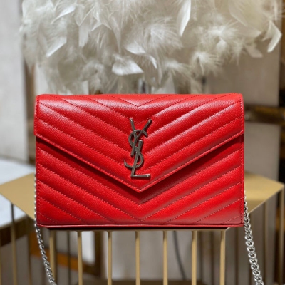 YSL聖羅蘭Yves Saint Laurent MONOGRAM WOC 魚子醬紋路原廠皮版本信封包.超級實用的一款小包，最經典的款式，升級最高級的版本，100%原廠牛皮配上精細手工製作；定制金屬YSLlogo彰顯個性；翻蓋設計確保使